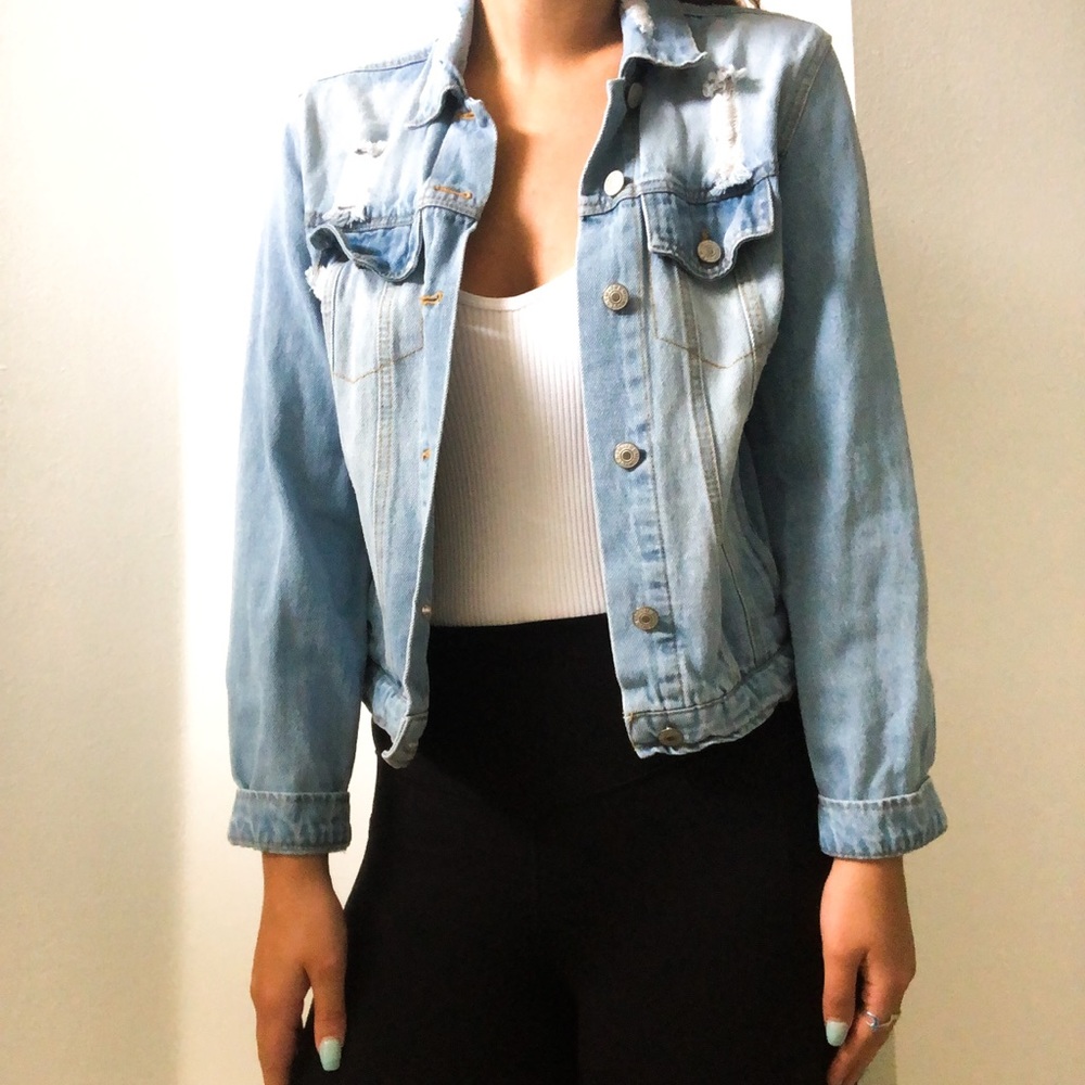Distressed denim jacket